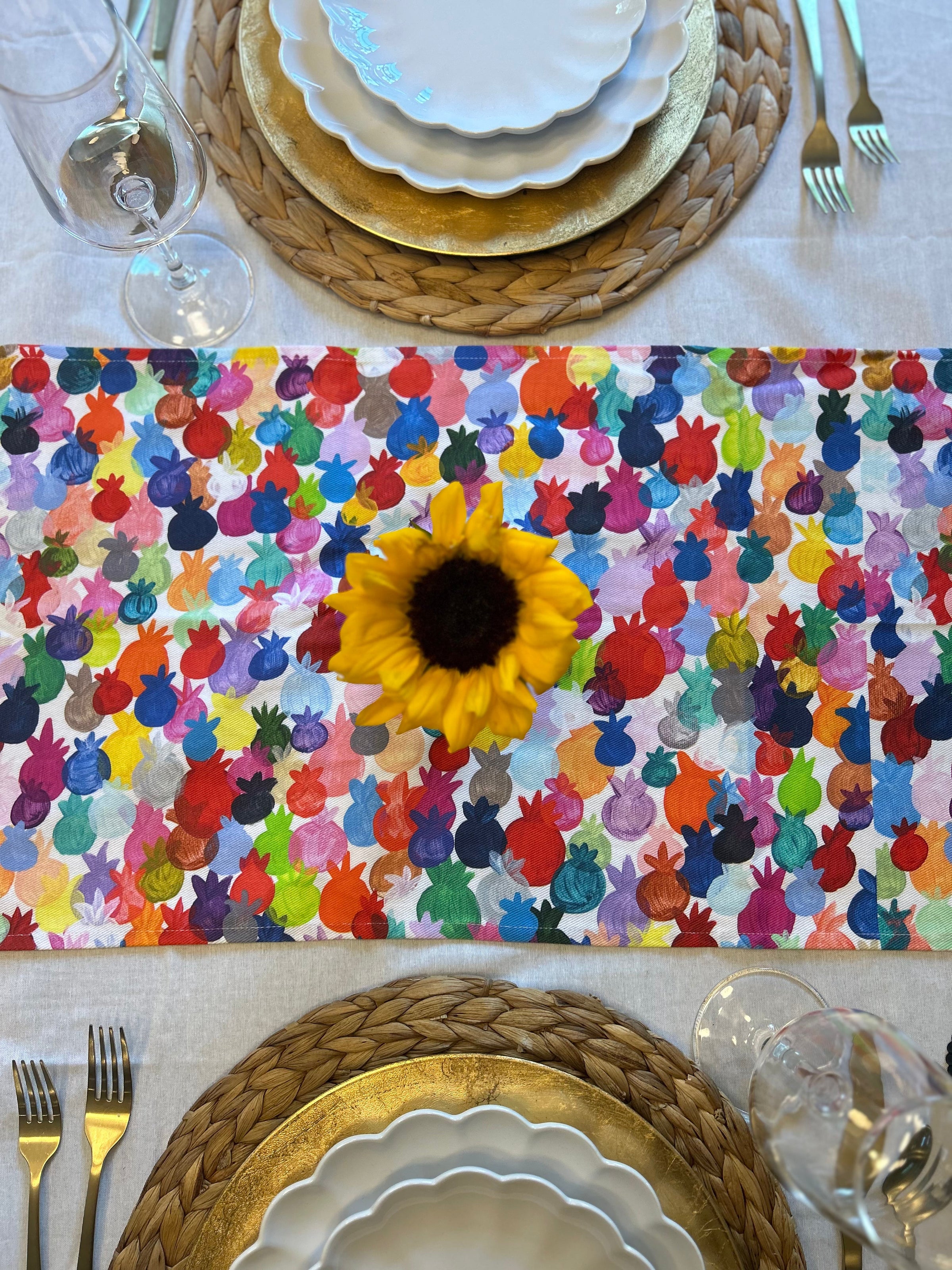 Rainbow Pomegranates Collection featuring colorful modern Judaica and coordinating Rosh Hashanah table décor by Arielle Zorger Designs