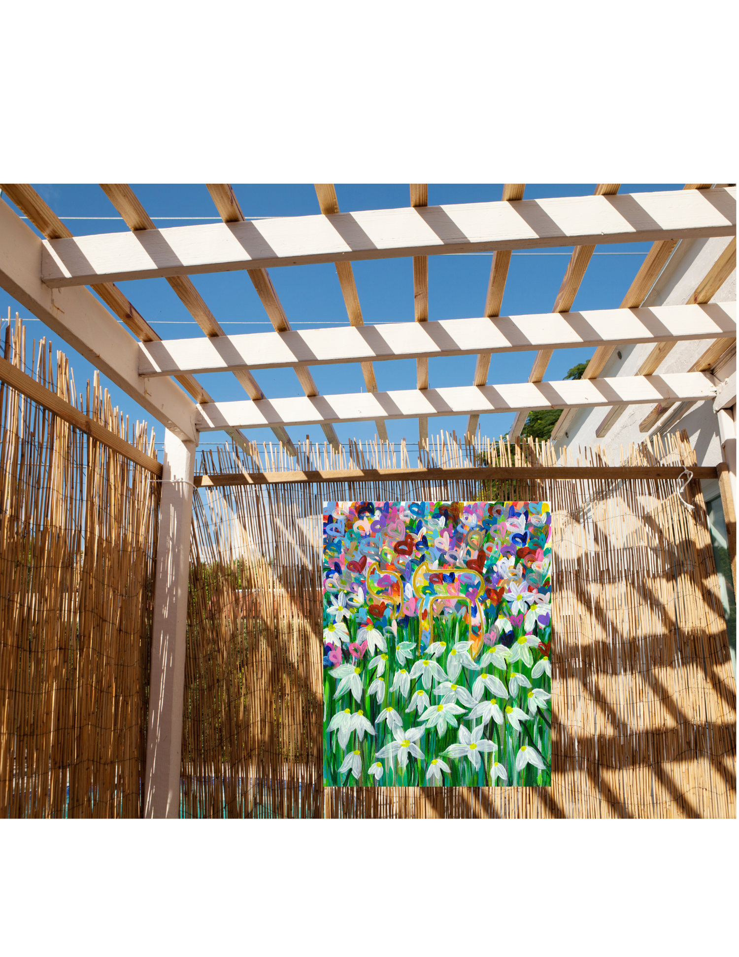 Colorful modern Sukkot decor with Chai heart artwork