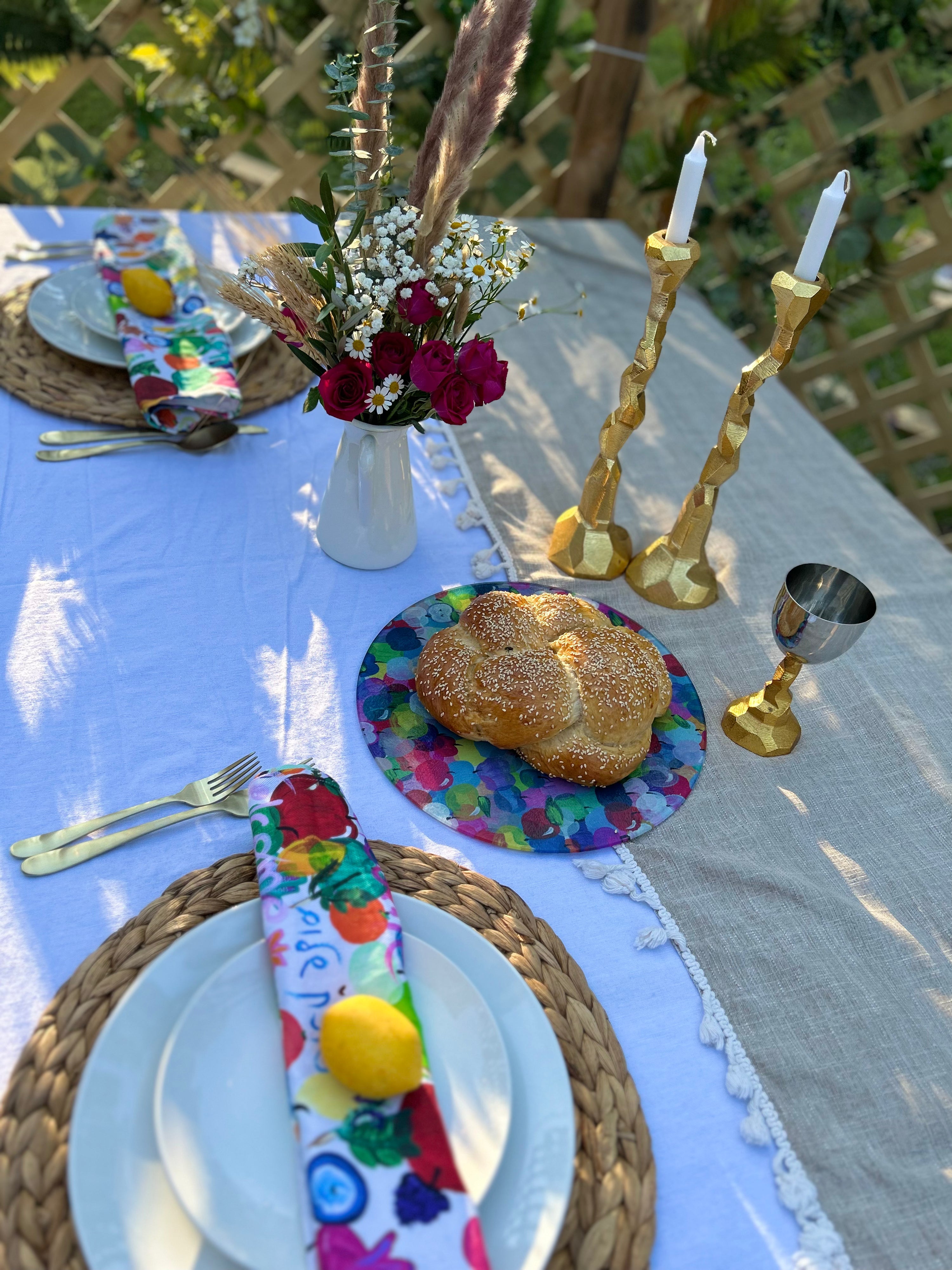 Modern Jewish holiday cloth napkins for a Sukkah table