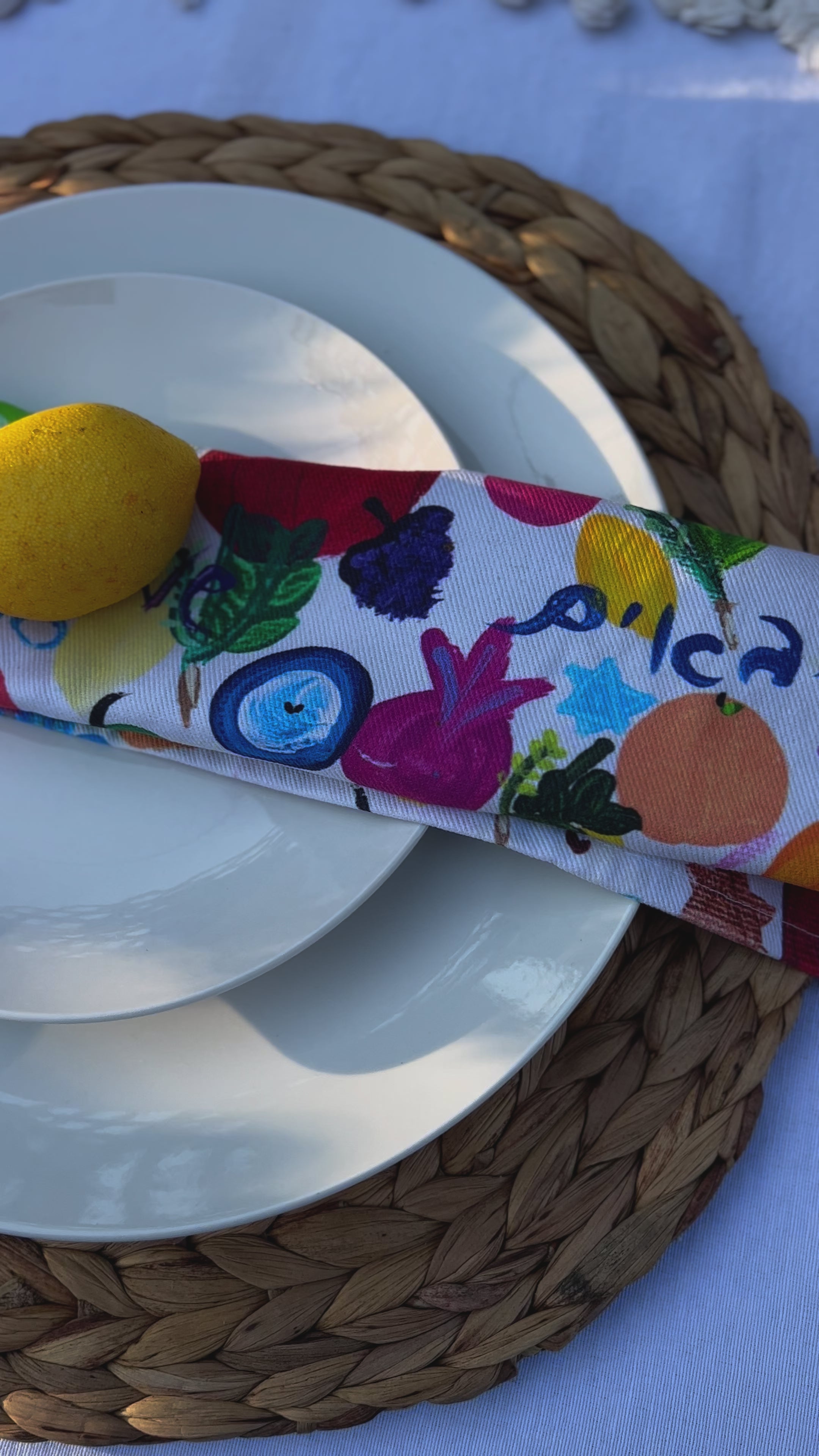 Colorful Sukkot napkins featuring original Jewish artwork